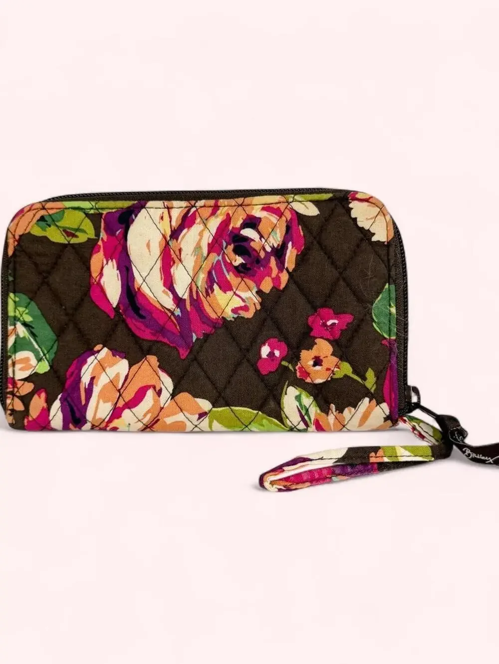 Vera Bradley floral zip around quilted wallet with wrist strap.